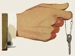 Dangles: Keyring on Man's Finger