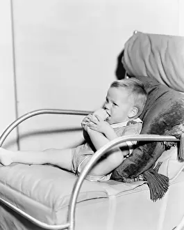 Flexibility: Kid chewing on toes