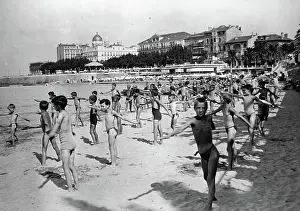 Excercises: Kids do some excercises at the beach