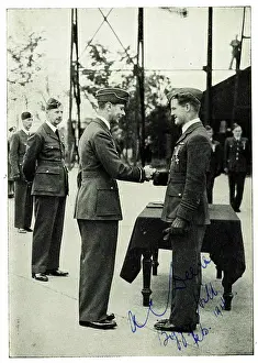Decorating: King George VI decorating Squadron Leader A.C. Deere