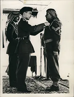 Adhere: King Hussein of Jordan presenting a medal