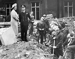 King and Queen inspecting bomb damage at Buckingham Palace