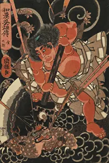 Kintoki killing a giant bear with his huge axe