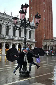 Dunn: Kissing in the rain - St Mark's, Venice