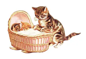 Rockers: Two kittens in a cradle on a cutout greetings card