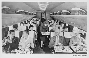 Pillows: KLM Constellation plane interior with passengers