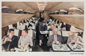 Pillow: KLM Constellation plane interior with passengers