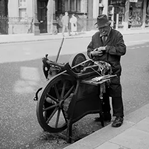Grinder: Knife grinder at work, Central London