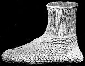 Convalescing: Knitting shoe for a wounded soldier