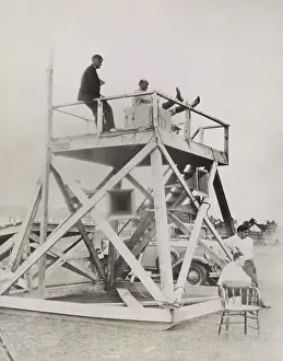 Loudspeakers: Knute Rockne, seated on coaching tower