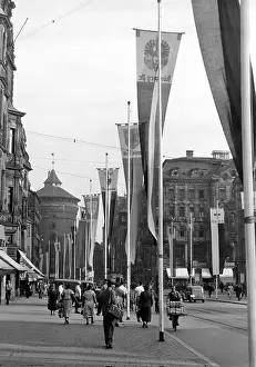 Flagpoles: Koenigstrasse with emblem flags in Nuremberg circa 1937