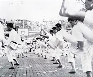 Kick: Korean men performing the traditional martial