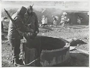 Middlesex: Korean War - two soldiers at well