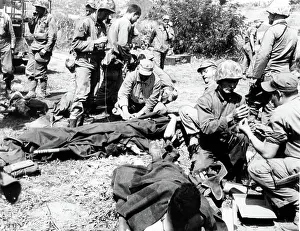 Cvpl: KOREAN WAR-Wounded Marines receive emergency ?
