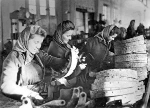 Plenik: Laborers (Eastern female workers) in a repair station for mo