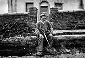 Digger: Labourer Mr Idris Silman takes a break, Tredegar, Wales