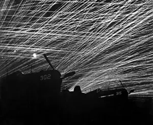 Anti Aircraft: A lacework of anti-aircraft fire by the Marine