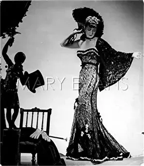 Flaring: LACY GOWN CIRCA 1940