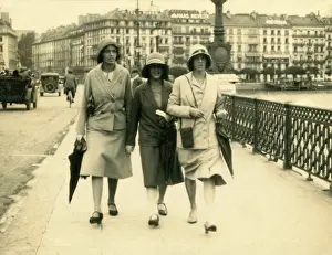 Cloche: Three ladies walking along the pavement together