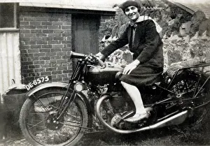 Dustbins: Lady on a 1930 Raleigh motorcycle