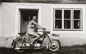 Puch: Lady on a 1958/9 Puch motorcycle