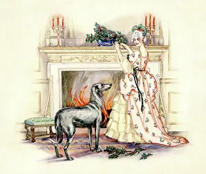 Arranging: Lady arranging holly on a mantlepiece