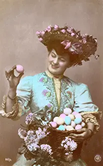 Easter: Lady with a basket full of decorated Easter eggs