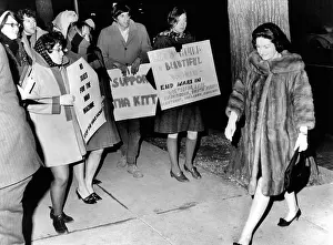 Protester: Lady Bird Johnson walks past a group of ?