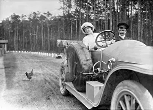 Evades: Lady is driving a convertible