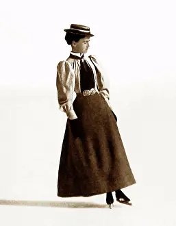 Backward: Lady figure skater doing a backward outside edge