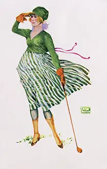 Windswept: Lady golfer looking down the fairway for her drive
