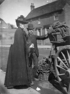 Greengrocer: Lady at greengrocer's cart