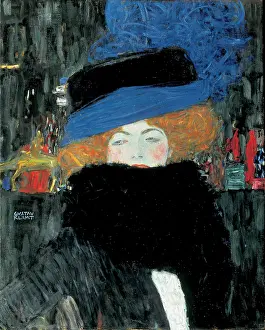 Lady with hat and feather boa