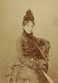 Gorizia: Lady with hood and striped jacket and umbrella