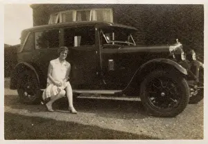 Grenville Collins / Tom Gillmor Collection: A lady ('Marion') - sitting on the running board of her car