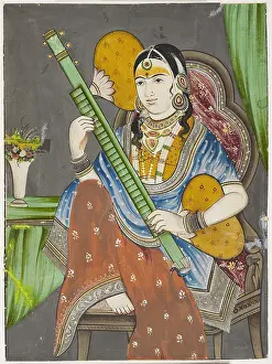 Lady playing {vina}