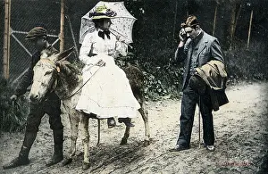Mops: Lady riding side-saddle on a donkey