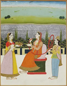 Shisha: A lady seated smoking on a terrace