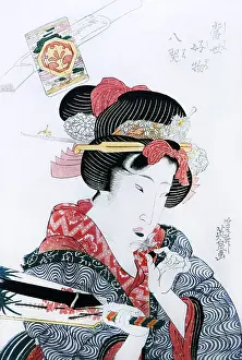 Ballgame: Lady with shuttlecock and racket