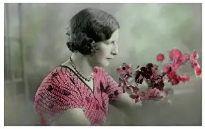 Smells: Lady sniffing some blooms