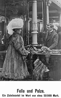 Expensive: Lady trying on a coat, 1908