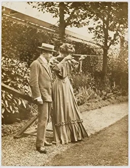 Learns: LADY USING AIR RIFLE