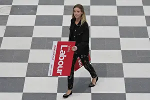 Corbyn: Lady With Vote Labour Banners