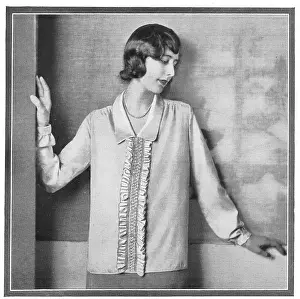 Ruffle: A lady's jumper with a ruffle