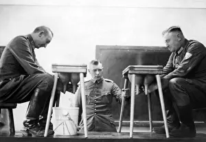 Stools: Lance corporals during milking training, 1932