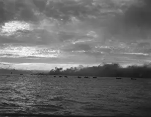 Smokescreen: Landing craft loaded with U.S. Marines head for