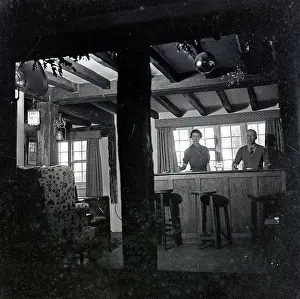 Panels: Landlord and landlady in a pub