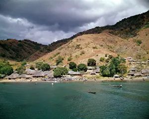 Vistas: Landscape of village on the banks of a river in the