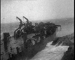Battered: A Large Allied Landing Craft Being Battered