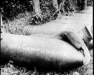 Compliments: A Large Artillery Shell Inscribed With With